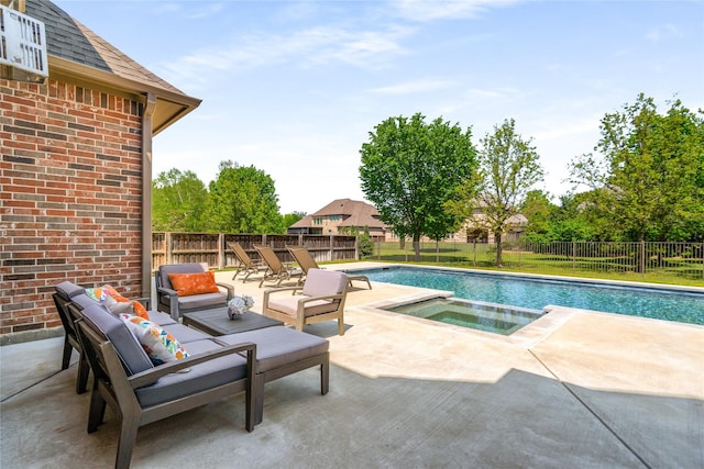 view of pool featuring a fenced in pool, a fenced backyard, an in ground hot tub, a patio, and an outdoor living space