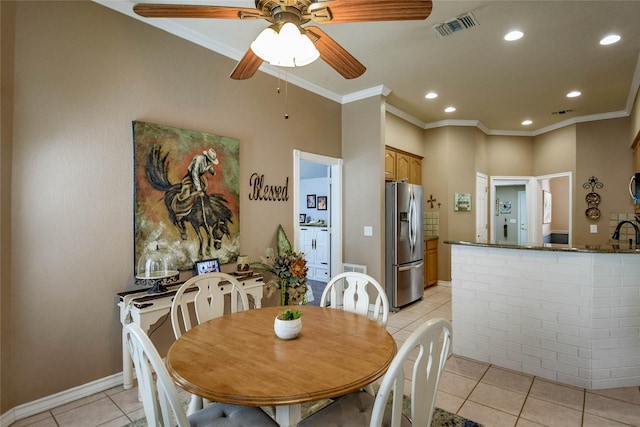 dining space with recessed lighting, visible vents, a ceiling fan, light tile patterned floors, and crown molding