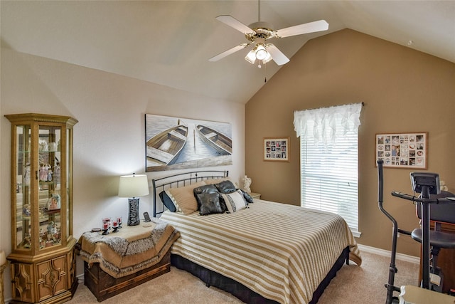 bedroom with carpet floors, lofted ceiling, baseboards, and ceiling fan