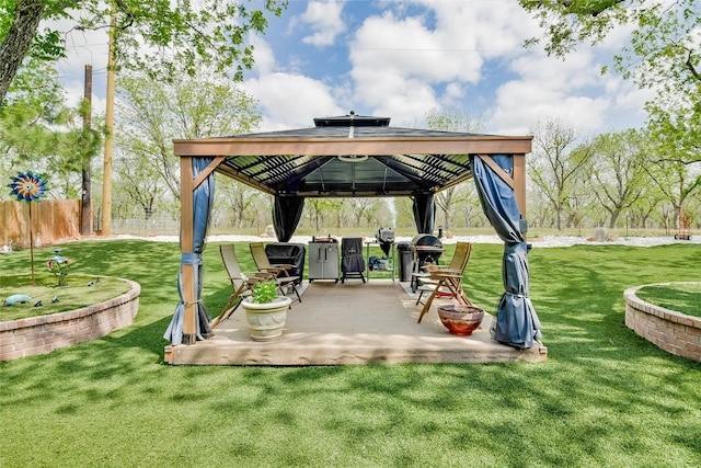 view of patio / terrace with a gazebo and fence