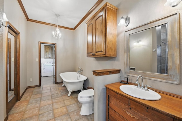 1350 Bennett Rd, Millsap, TX 76066 - bathroom with vanity, washer / dryer, a freestanding bath, ornamental molding, and stone finish floor