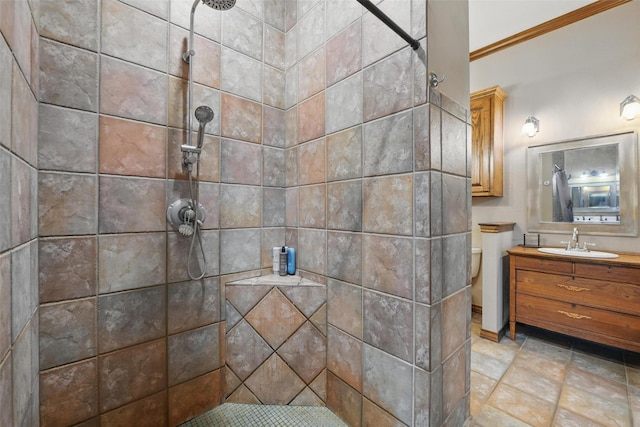1350 Bennett Rd, Millsap, TX 76066 - full bath featuring a tile shower, toilet, ornamental molding, and vanity