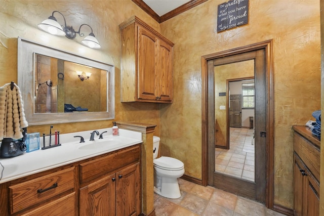 1350 Bennett Rd, Millsap, TX 76066 - bathroom with a textured wall, toilet, vanity, and ornamental molding