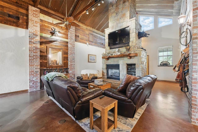 1350 Bennett Rd, Millsap, TX 76066 - living room featuring a fireplace, high vaulted ceiling, wooden ceiling, and finished concrete floors