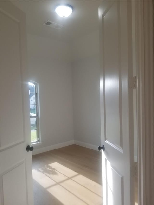 1525 Wild Indigo Dr, Mansfield, TX 76063 - unfurnished room with baseboards, wood finished floors, and visible vents