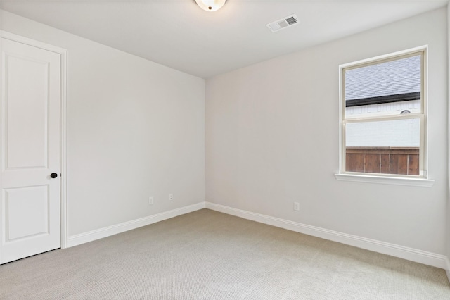 1525 Wild Indigo Dr, Mansfield, TX 76063 - spare room with baseboards, visible vents, and light colored carpet
