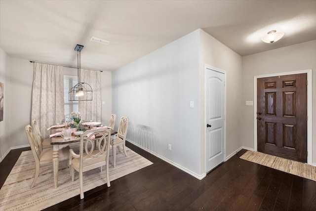 14116 Rabbit Brush Ln, Fort Worth, TX 76052 - dining space with an inviting chandelier, dark wood-style flooring, visible vents, and baseboards