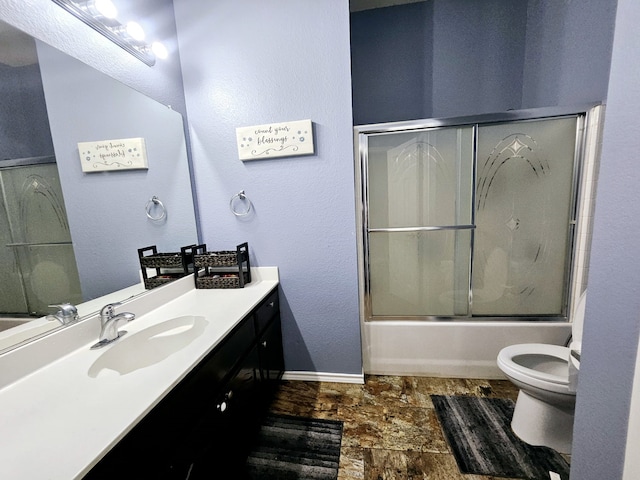 3019 Stallion Xing, Irving, TX 75060 - bathroom with baseboards, vanity, and toilet