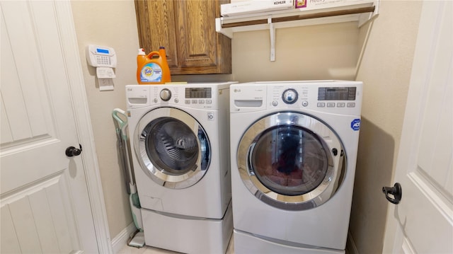 laundry area with washer and clothes dryer