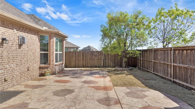 view of patio with a fenced backyard