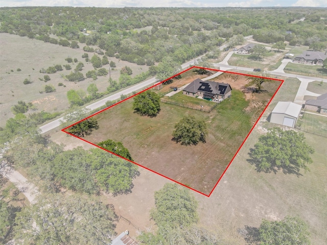 aerial view with a wooded view