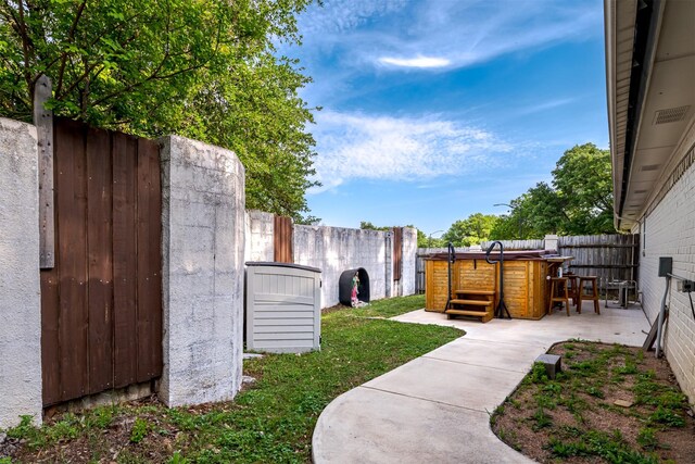 view of yard featuring a patio area and a fenced backyard