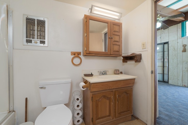 bathroom featuring walk in shower, visible vents, toilet, and vanity