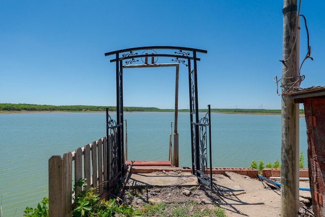 view of dock with a water view
