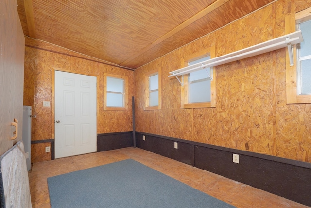 interior space with wood ceiling and lofted ceiling