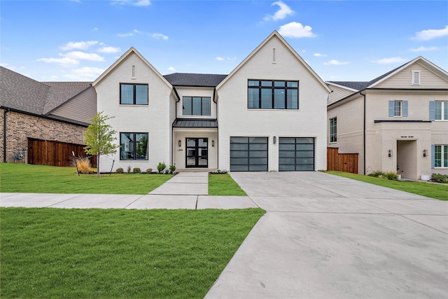 modern farmhouse style home featuring driveway, metal roof, fence, a garage, and a standing seam roof
