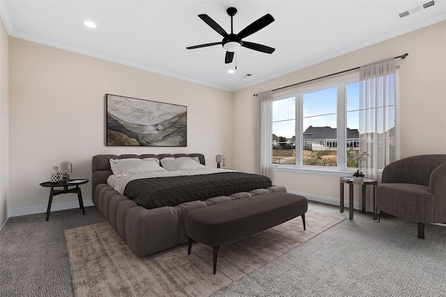 carpeted bedroom with recessed lighting, visible vents, crown molding, and baseboards