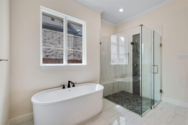 bathroom featuring baseboards, a soaking tub, marble finish floor, and a stall shower