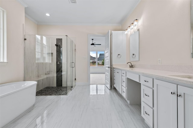 full bathroom with a shower stall, ornamental molding, a freestanding tub, and double vanity