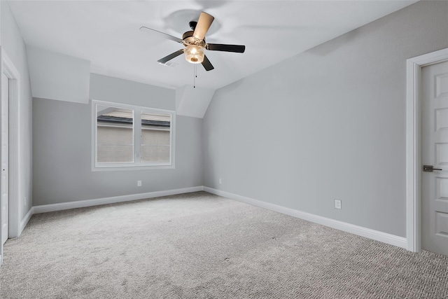 unfurnished bedroom featuring carpet flooring, baseboards, and a ceiling fan