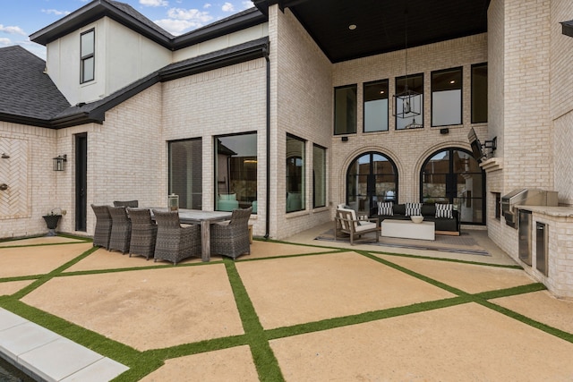 1501 Latigo Ct, Prosper, TX 75078 - view of patio / terrace featuring exterior kitchen, an outdoor hangout area, and outdoor dining space
