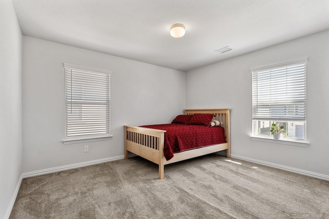 4652 Raleigh Dalton Rd, Dallas, TX 75227 - carpeted bedroom featuring baseboards and visible vents