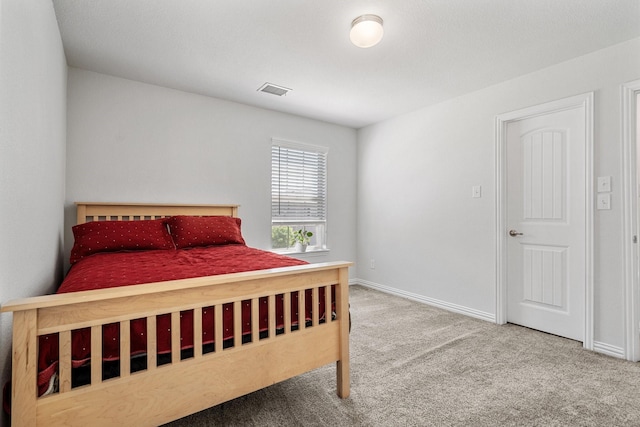 4652 Raleigh Dalton Rd, Dallas, TX 75227 - bedroom with baseboards, carpet flooring, and visible vents