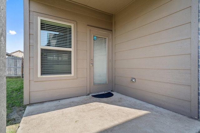 4652 Raleigh Dalton Rd, Dallas, TX 75227 - view of exterior entry with fence and a patio