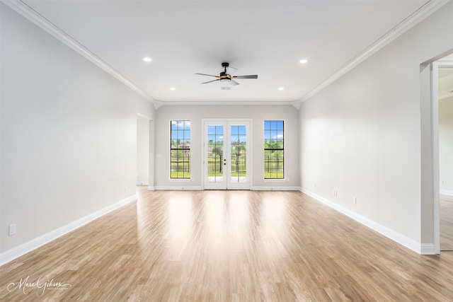 unfurnished living room with recessed lighting, light wood-style floors, crown molding, baseboards, and ceiling fan