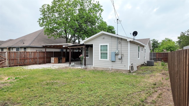 2904 Chestnut Ave, Fort Worth, TX 76106 - rear view of property with central air condition unit, a lawn, a fenced backyard, and a patio