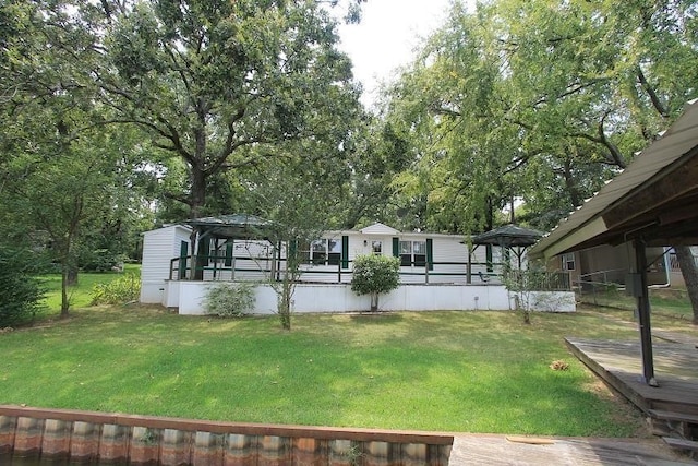 view of yard with a deck