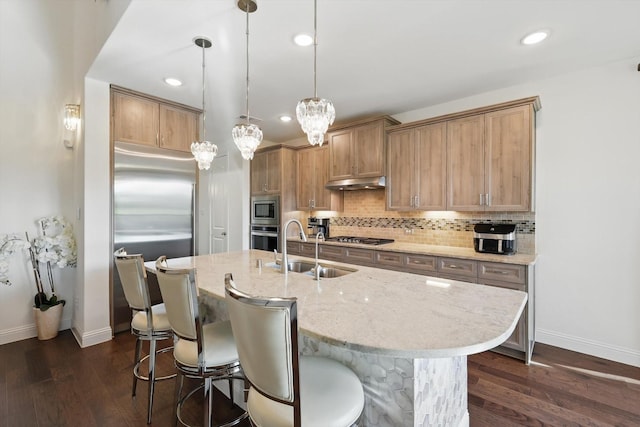 14329 Home Trl, Fort Worth, TX 76262 - kitchen featuring baseboards, appliances with stainless steel finishes, under cabinet range hood, and a sink