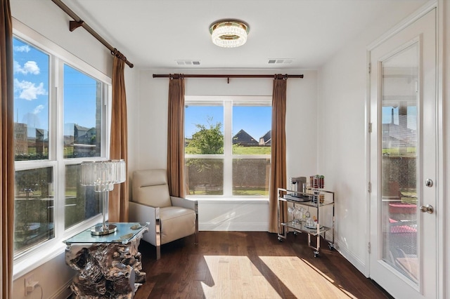 14329 Home Trl, Fort Worth, TX 76262 - sitting room with wood finished floors, visible vents, and baseboards