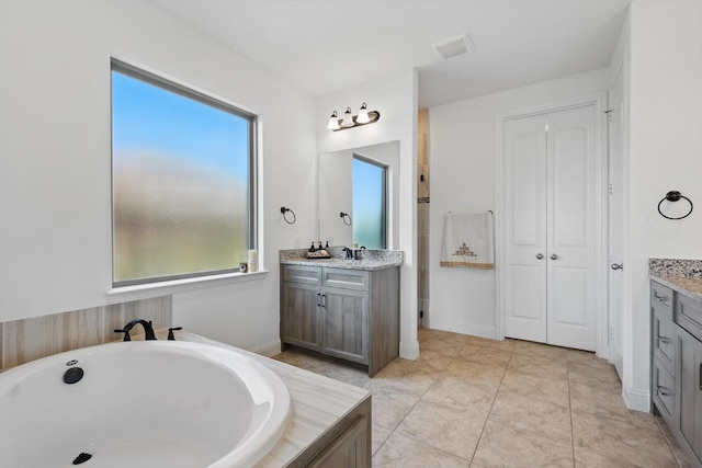 14329 Home Trl, Fort Worth, TX 76262 - full bath with visible vents, a bathtub, and vanity
