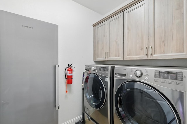 14329 Home Trl, Fort Worth, TX 76262 - laundry area with cabinet space, independent washer and dryer, and baseboards