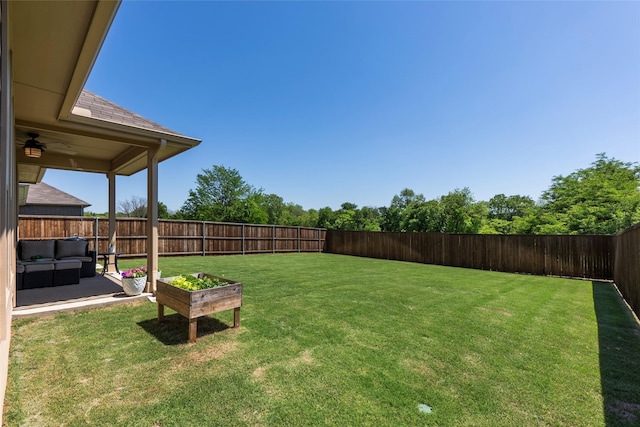 view of yard with a fenced backyard and an outdoor hangout area