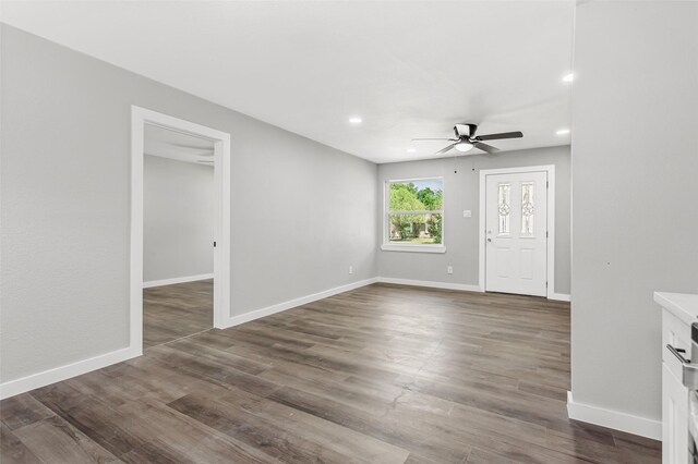 4227 Harvey Dr, Mesquite, TX 75150 - empty room featuring ceiling fan, recessed lighting, dark wood-style flooring, and baseboards