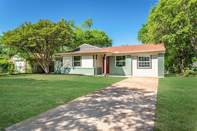 4227 Harvey Dr, Mesquite, TX 75150 - ranch-style home featuring brick siding and driveway