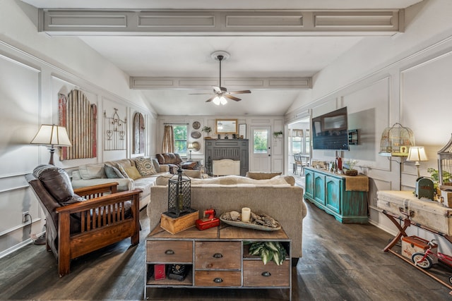 living area with ceiling fan, vaulted ceiling with beams, and dark wood-style flooring
