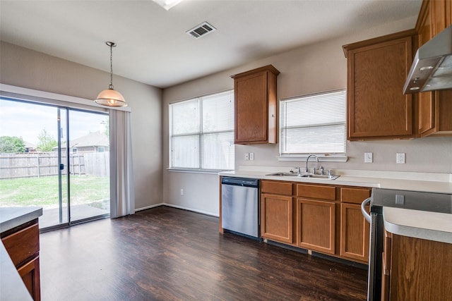 504 Ame Ln, Royse City, TX 75189 - kitchen featuring stainless steel dishwasher, a sink, wall chimney exhaust hood, stove, and brown cabinets