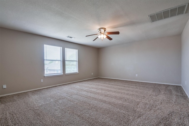 504 Ame Ln, Royse City, TX 75189 - carpeted empty room with a ceiling fan, a textured ceiling, and baseboards