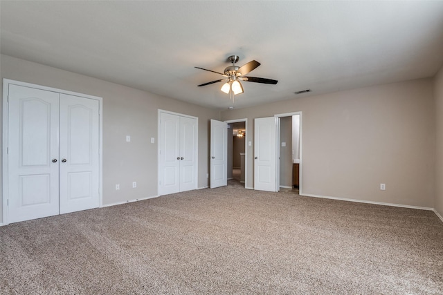 504 Ame Ln, Royse City, TX 75189 - unfurnished bedroom with multiple closets, carpet, and baseboards