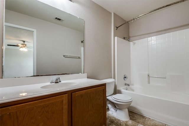 504 Ame Ln, Royse City, TX 75189 - bathroom with toilet, vanity, shower / bathtub combination, tile patterned floors, and ceiling fan