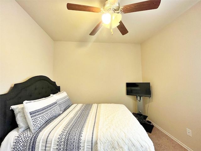 bedroom featuring ceiling fan, baseboards, and carpet flooring