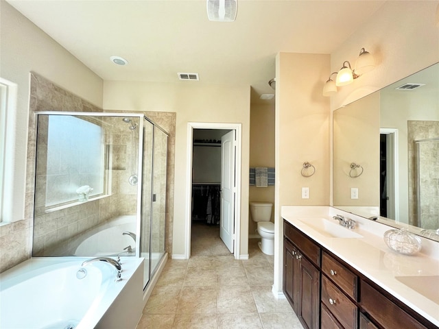 bathroom featuring visible vents, a sink, and a shower stall