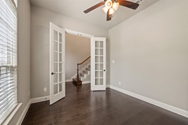 1860 Halifax St, Roanoke, TX 76262 - spare room featuring a ceiling fan, french doors, baseboards, dark wood-style floors, and stairs