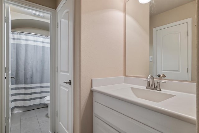 2833 Macquarie St, Trophy Club, TX 76262 - bathroom with toilet, tile patterned floors, visible vents, and vanity