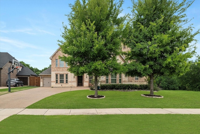 2833 Macquarie St, Trophy Club, TX 76262 - obstructed view of property featuring a front lawn, stone siding, a garage, brick siding, and driveway