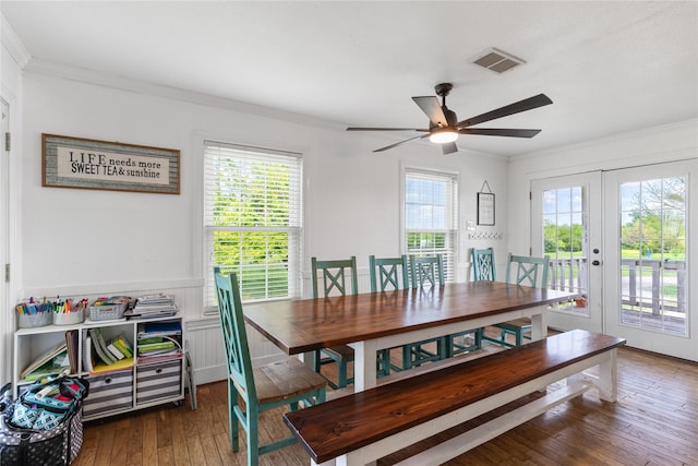 dining area with crown molding, ceiling fan, a healthy amount of sunlight, and french doors
