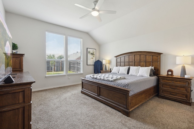 2820 Lone Ranger Trl, Little Elm, TX 75068 - carpeted bedroom featuring vaulted ceiling, baseboards, and ceiling fan